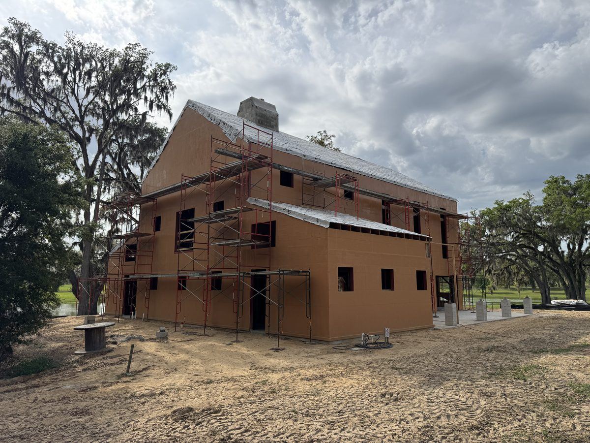 Air and water barrier on a two-story mixed CMU and wood-framed building